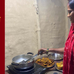 मधेसी महिला इन्डक्सन चुलोमा खाना पकाउँदै, दाउरा र धुवाँबाट मुक्ति